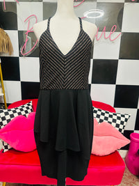 BLACK SLEEVELESS DRESS WITH CROSS CROSS DETAIL