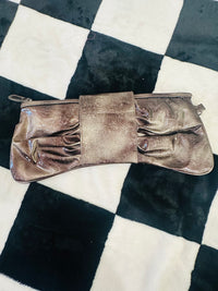 Acid wash bow clutch bag