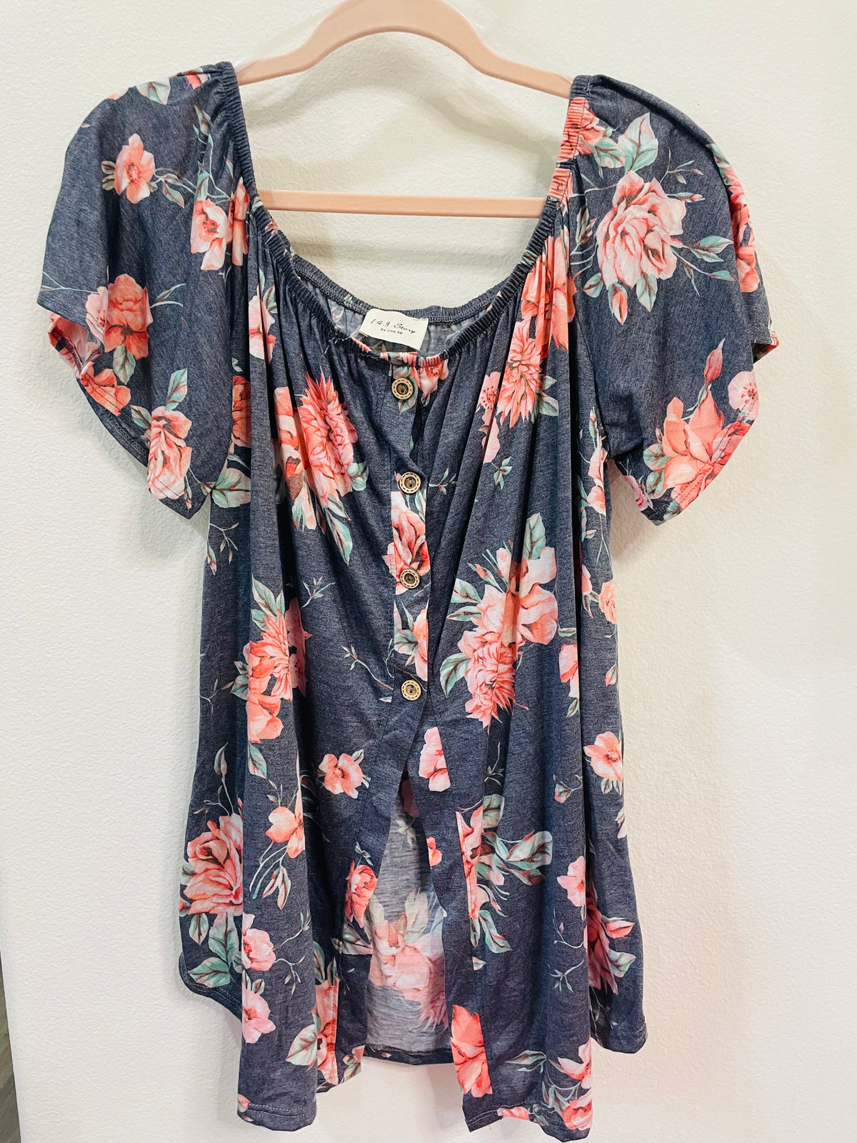 FLORAL BUTTON HALF WAY OPEN BELLY TOP