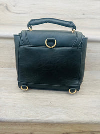 Convertible black faux fur backpack bag