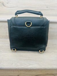 Convertible black faux fur backpack bag