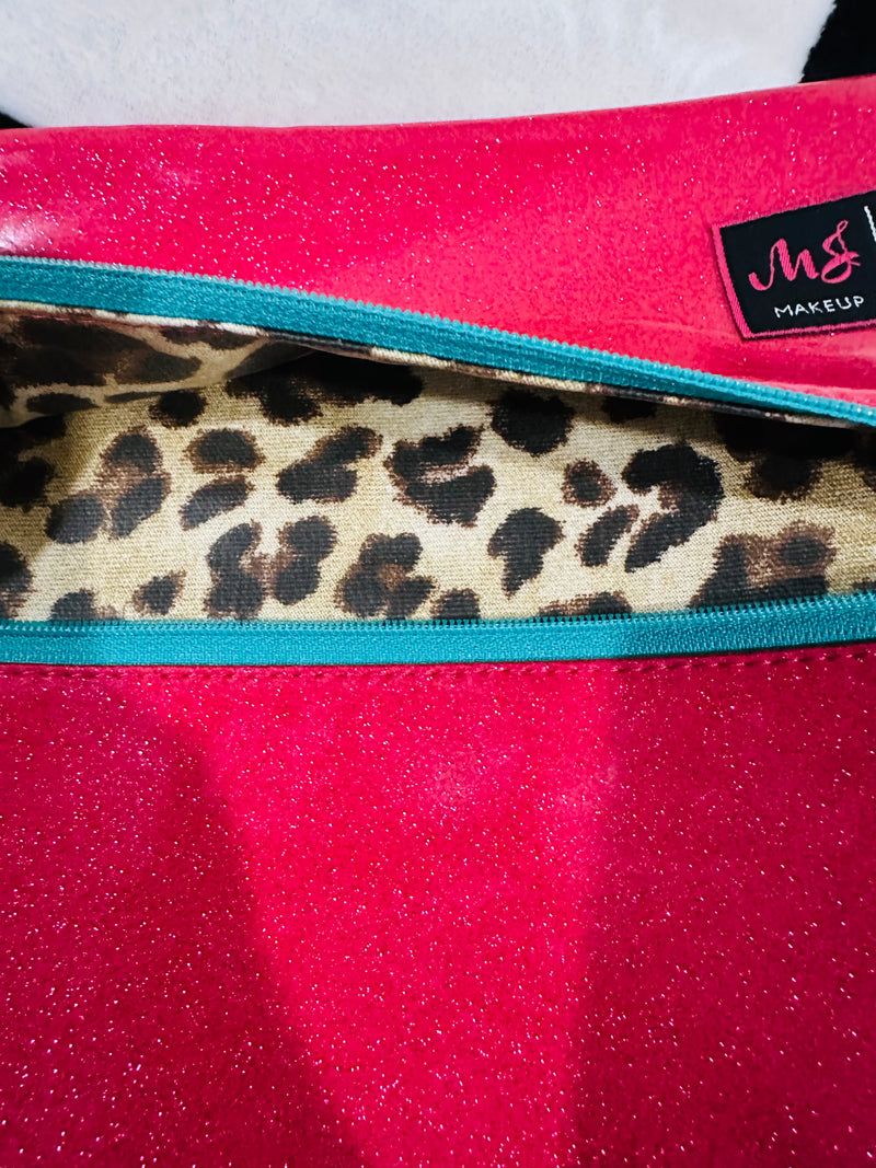 Hot pink glitter med. MJ BAG  with teal zipper and leopard inside.