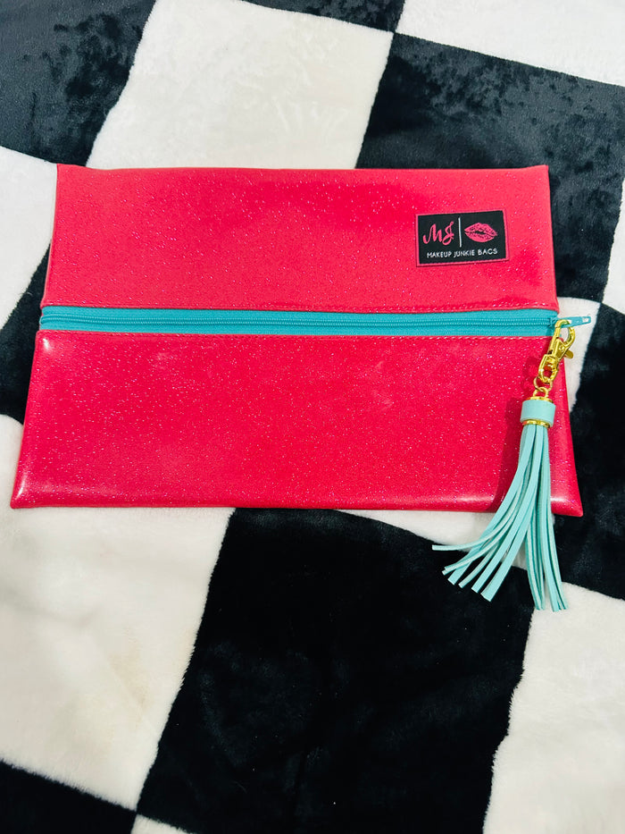 Hot pink glitter med. MJ BAG  with teal zipper and leopard inside.