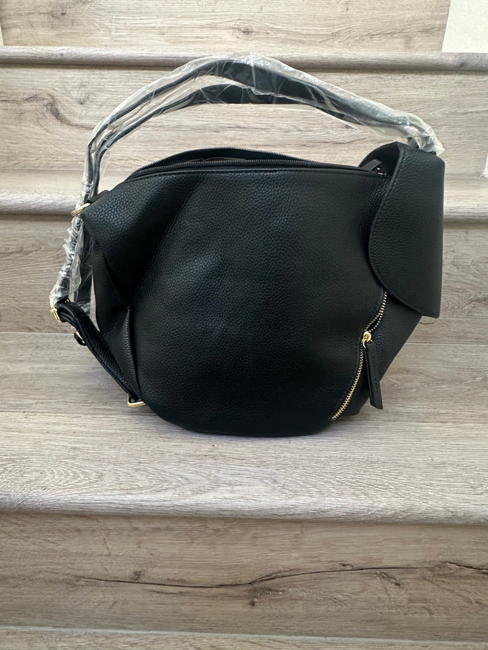 Black asymmetrical coverable handbag to backpack