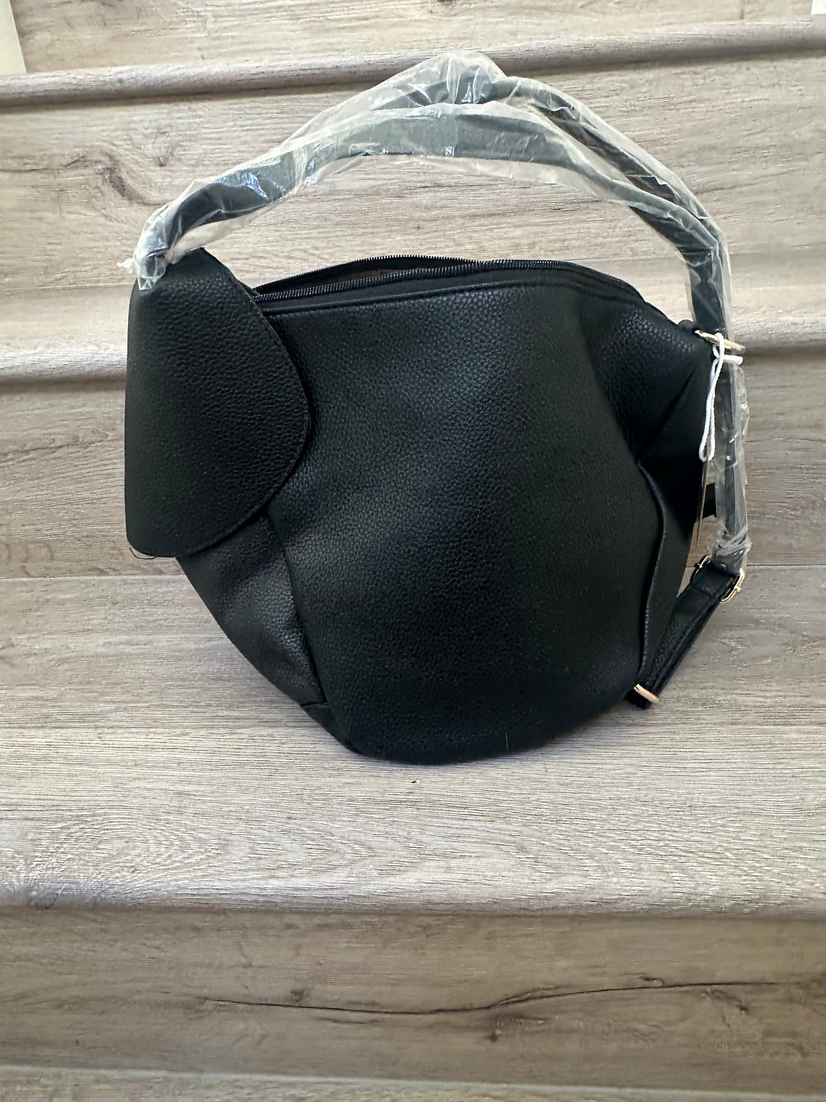 Black asymmetrical coverable handbag to backpack