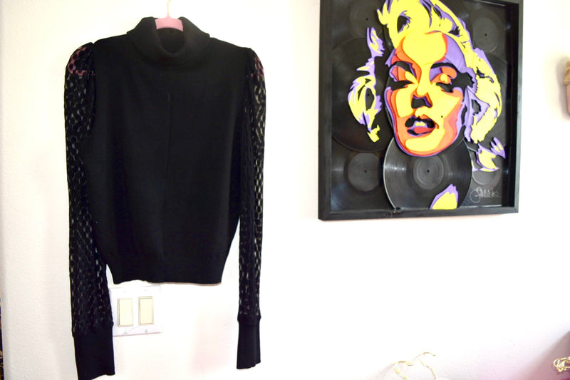 BLACK TURTLE NECK WITH SLEEVE DETAIL